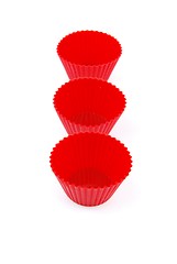 Image showing Red plastic cups for small cakes on white