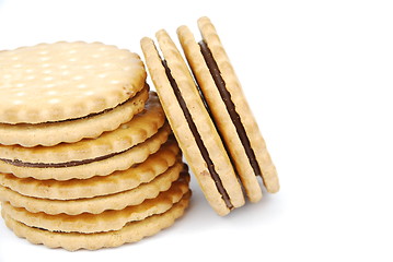 Image showing Chocolate cookies stack on white