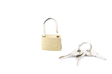 Image showing Golden open padlock with keys on white