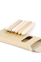 Image showing Colour pencils and pencil case on white