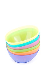 Image showing Stacked colorful bowls on white