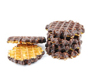 Image showing Chocolate waffles stacked on white