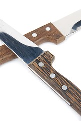 Image showing Close-up of wooden kitchen knifes on white