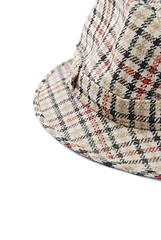 Image showing Close-up of a checked brown hat on white