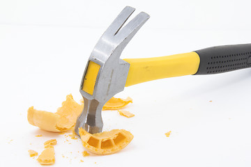 Image showing Hammer pounding an ice cream cone