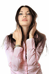 Image showing Portrait of pretty young woman in pink shirt