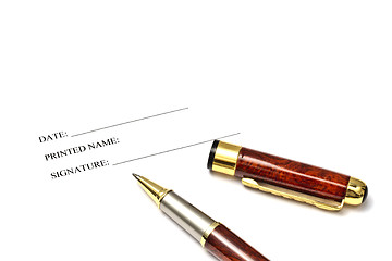 Image showing A pen isolated on a blank signature paper 