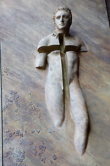 Image showing Religious sculpture on a door