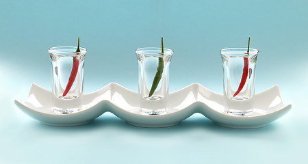 Image showing Chillies In Shot Glasses