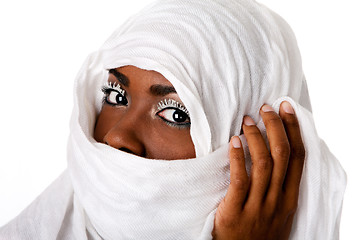 Image showing Female face in white scarf