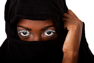 Image showing Female face in black scarf