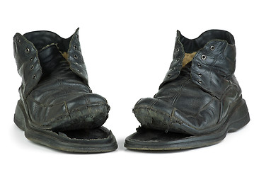 Image showing Pair of torn old boots