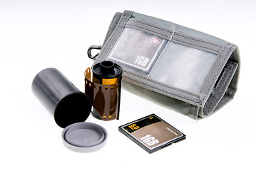 Image showing Negative and digital film. Storage canister and card wallet with card.