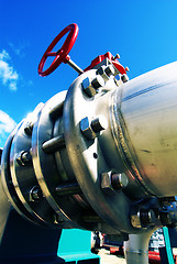 Image showing Industrial zone, Steel pipelines and valves against blue sky