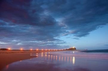 Image showing lighthouse and breakwater at night