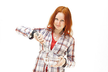 Image showing redhead young woman cooks dinner