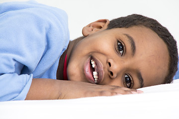 Image showing Boy resting in his bed