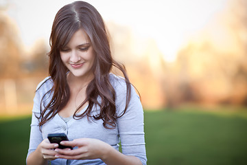 Image showing Woman texting