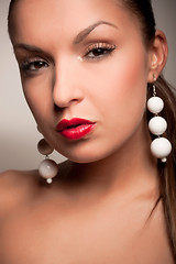 Image showing attractive girl with white earring