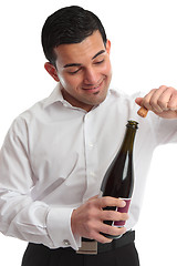 Image showing Removing cork from wine