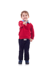 Image showing Boy looking to you and pointing
