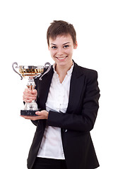 Image showing  business woman holding a silver cup