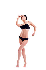 Image showing bikini model stanting on white  background