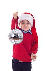 Image showing santa kid holding a disco ball