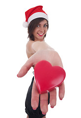 Image showing santa girl taking a heart