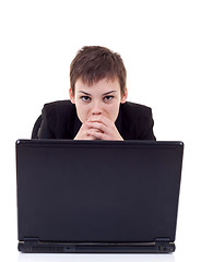 Image showing pensive woman working on laptop