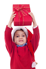 Image showing boy stretches out a present