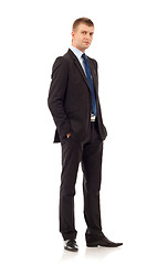 Image showing business man with hands in pockets