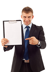 Image showing man showing a blank clipboard