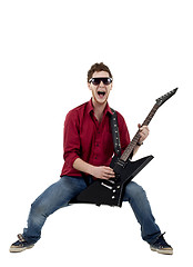 Image showing Musician with guitar singing