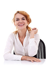 Image showing  woman sitting at her desk