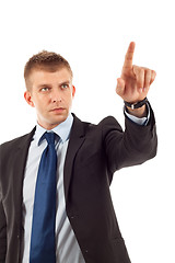 Image showing business man pushing an imaginary button 