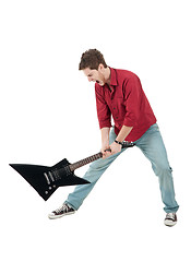 Image showing angry man holding a guitar 