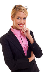 Image showing Business woman thinking and smiling