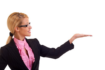 Image showing Smiling business woman presenting