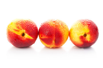 Image showing The ripe red peaches