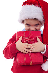 Image showing Boy holding a christmas gift