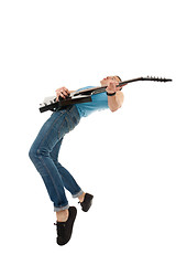 Image showing rock star playing with passion