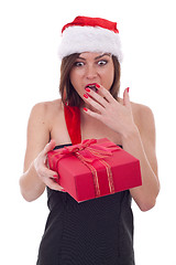 Image showing Surprised woman with santa hat