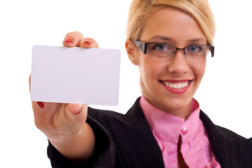 Image showing Business woman smiling holding card