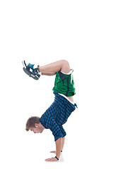 Image showing Young bboy standing on hands