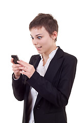 Image showing shoked woman looking at a phone