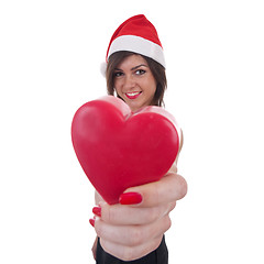 Image showing woman in Santa hat holding a heart