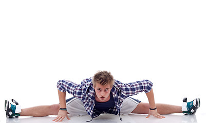 Image showing dancer posing with legs streched