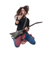 Image showing heavy metal rocker jumps 