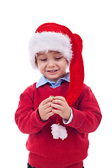 Image showing Santa kid playing with his cap